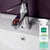 An image of a vooki limescale spray bottle, positioned on a sink.